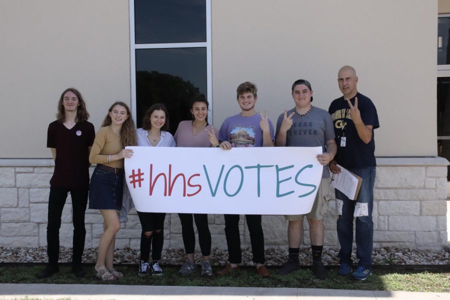 Tom Ray and several government students rode to the polls Friday.