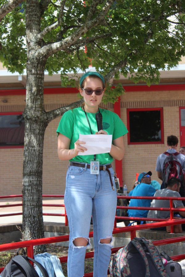 Reagan Flores, 11, talks on behalf of the animals on the importance of saving the environment before it's too late. 