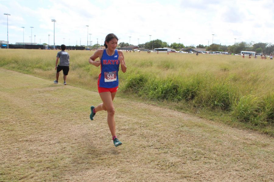 Adia Vera, 11, races toward the finish line of the regional cross country meet, which took place on Oct. 28 in Corpus Christi. 