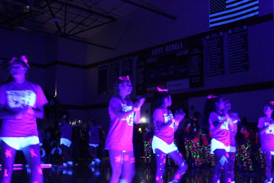 Blacklight/pink out pep rally