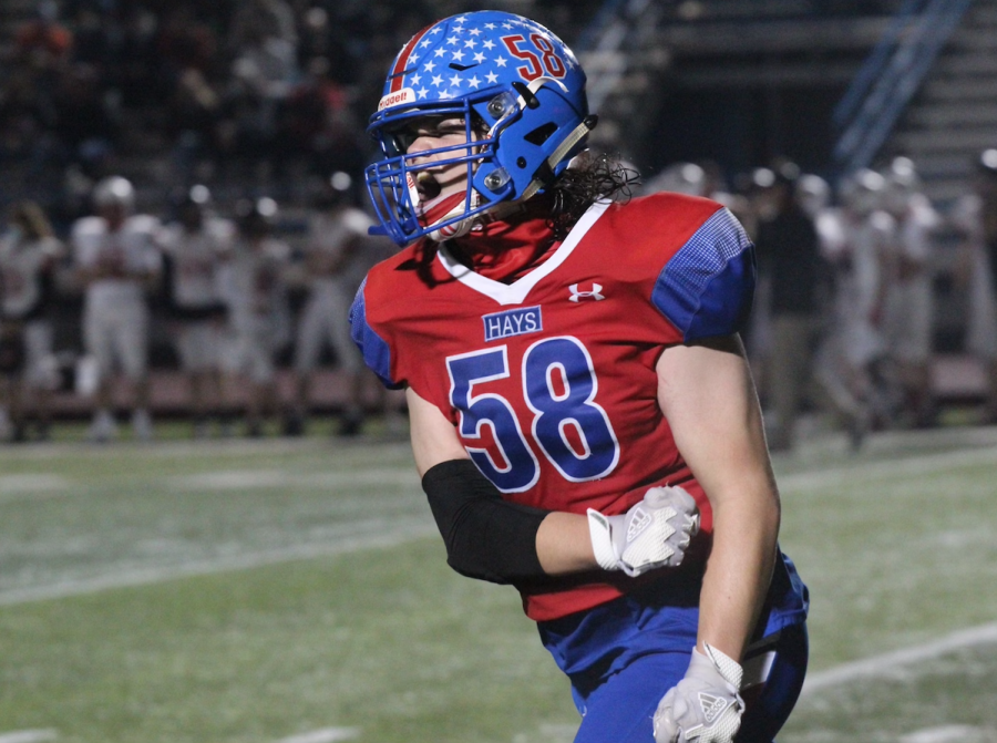 Kaden Morales #58 at the Vista Ridge game on December 11. Hays won 38-7, moving them on the next round of the play-offs.
Hays plays the San Antonio Johnson Jaguars tonight in Shelton Stadium.