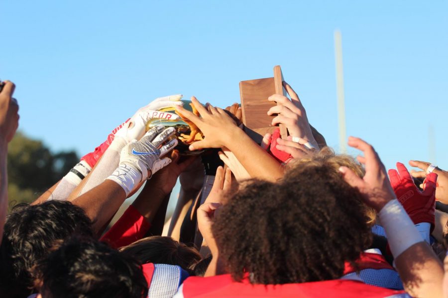 Hays football celebrates their Regional championship trophy after defeating Vandegrift 38-10.
The victory takes them to the 6A-D1 state semi-finals, happening this  Saturday against Katy. The game happens at 2 p.m. Saturday at Baylor’s McLane Stadium in Waco.