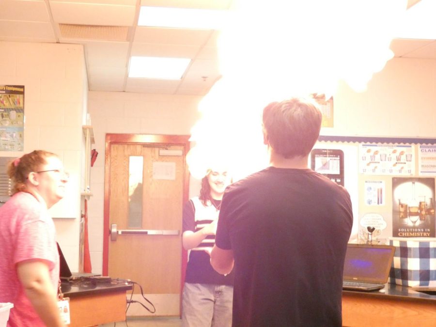 Science Club lights up the evening by setting hands on fire.